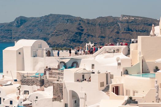 Classical view on the decoration and architecture of Oia village Santorini at sun weather