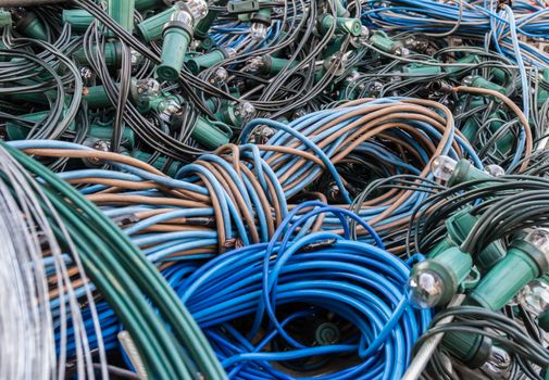 Mess of tangled old-style Christmas lights. Shallow DOF