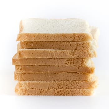 Stack of sliced white bread on white background