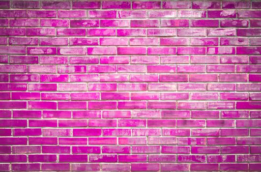 Bright colorful fuchsia brick wall