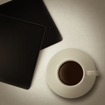 cup of coffee and tablet computer as vintage style concept