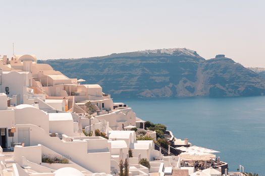 Classical view on the decoration and architecture of Oia village Santorini at sun weather