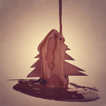 chocolate cocoa flow a christmas tree as vintage style concept