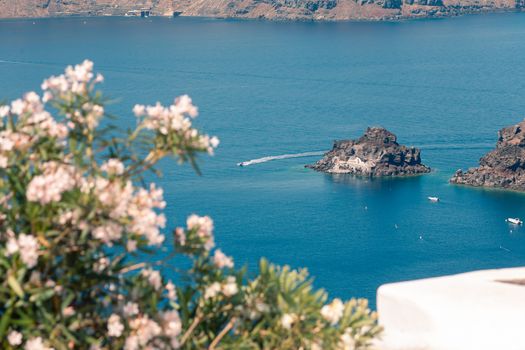 View on the seaside of Santorini island with ship on the sea