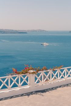 View on the seaside of Santorini island with ship on the sea