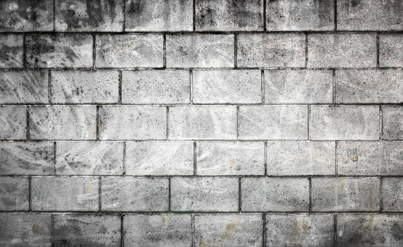 Grunge white and black brick wall background