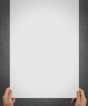 hand holding a blank paper sheet with both hands as concept