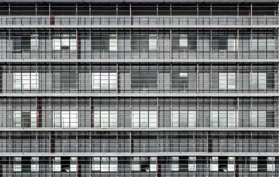 Geometrically correct architectural background of modern office building facade