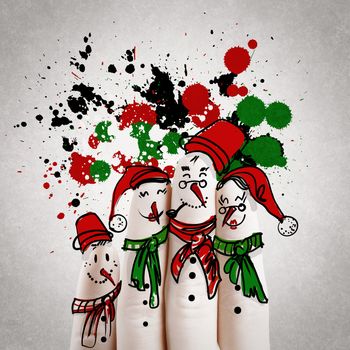 A lovely family hand drawn and finger of snowmen on splash colors background,as concept idea