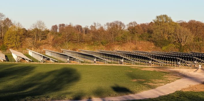 Generating clean energy with solar modules in a big park in northern Europe.