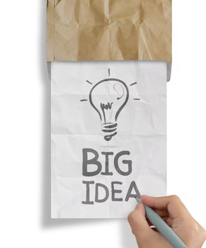 hand draws light bulb crumpled paperfrom recycle envelope as creative concept