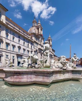 Piazza Navona in Rome on a sunny day. Baroque architecture and marble fountain with statues. Town square. Travel to European capitals