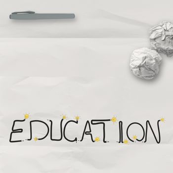 design word EDUCATION on white crumpled paper and texture background as concept