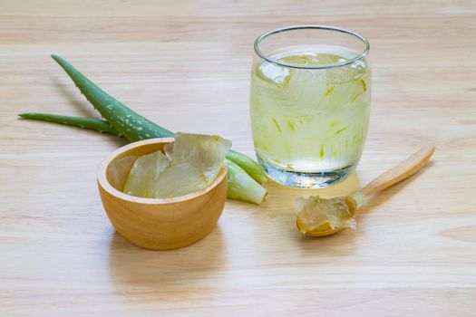 Aloe Vera for drinking on wood table 