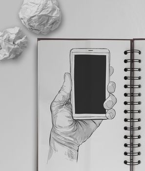 Hand drawn hands with mobile phone note book as concept