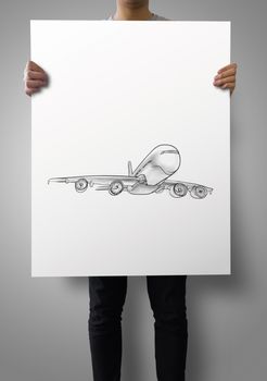 man showing poster of Airplane hand drawn as concept