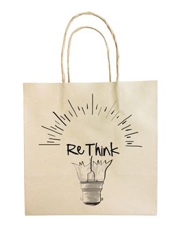 Hand drawn light bulb with RETHINK word paper recycle bag on white background as concept