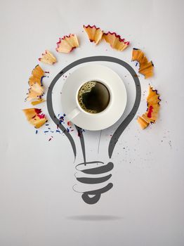 hand drawn light bulb with pencil saw dust and 3d cup of coffee on paper background as creative concept 