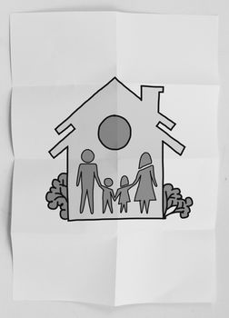 hand draw family and house on crumpled paper as insurance concept 