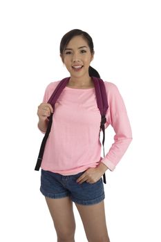 Portrait of beauty asian girl in pink t-shirt and blue jean shorts with backpack in studio.