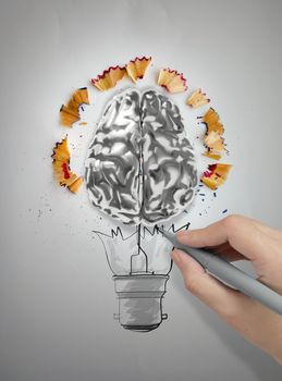 hand drawing light bulb with pencil saw dust and 3d brain icon on paper background as creative concept 