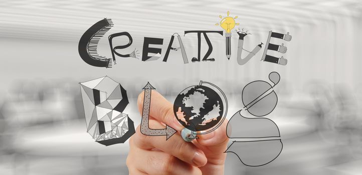 businessman hand draws creative blog word as concept