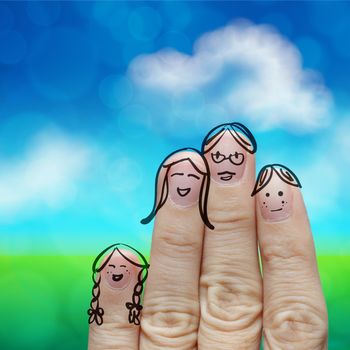 happy finger family on green nature background