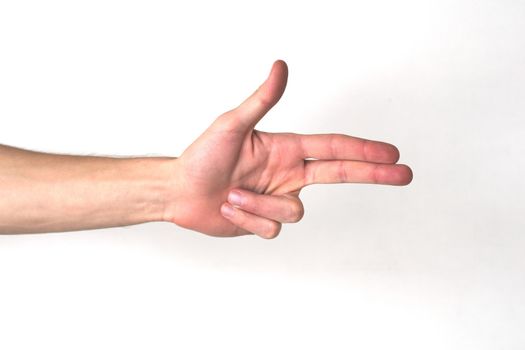 White hand making a pistol gesture