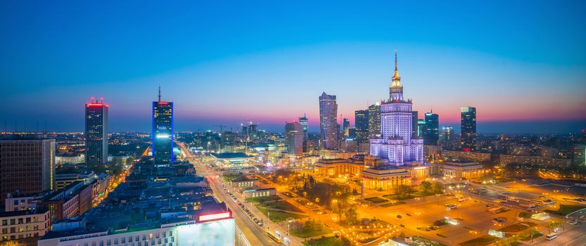 Aerial photo of  Warsaw city skyline in Poland at sunset