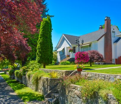 House on land terrace with nice lawn