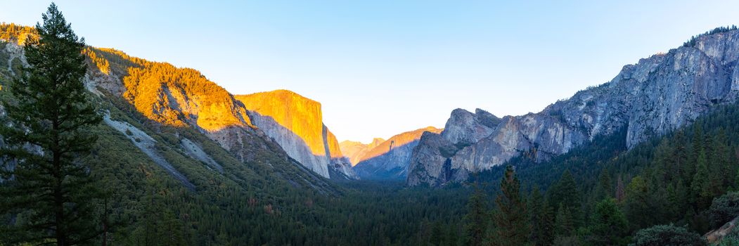 Yosemite valley nation park during sunset view from tunnel view on twilight time. Yosemite nation park, California, USA. Panoramic image.