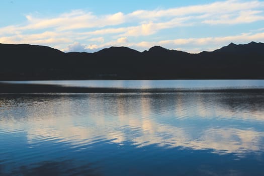 Blue twilight sky reflected on the waters of lake Potrero de los Funes, in San Luis, Argentina.