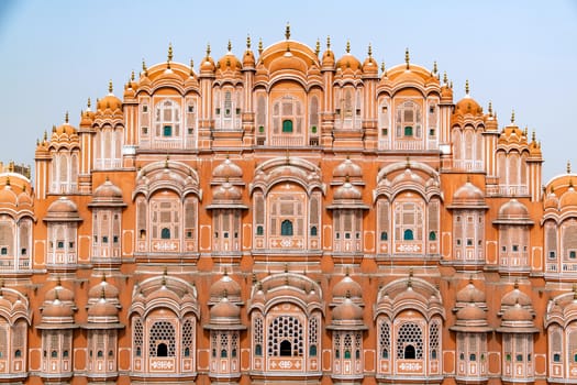 Hawa Mahal on a sunny day, Jaipur, Rajasthan, India. An UNESCO World heritage. Beautiful window architectural element.