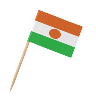 Small paper flag of Nepal on wooden stick, isolated on white