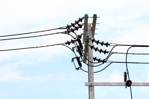 Electric pole power Tangle wire danger, wire electrical energy at street road on sky background