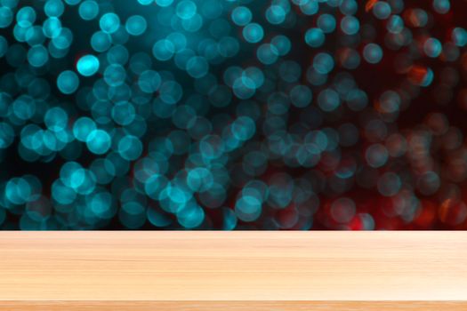 wood plank on abstract blurred blue red silver glittering shine bulbs lights background, empty wood table floors on Bokeh Blur dot light xmas, wood table board empty front sparkle circle lit display