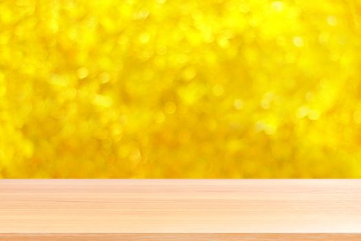 wood plank on bokeh golden yellow colorful background, empty wood table floors on bokeh glitter light gold luxury, wood table board empty front glittering gold, wooden on bokeh lighting shine gold