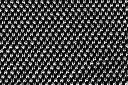 Texture of cloth material for design. Abstract background with white, black and gray threads of woven. Gipnotic wallpaper.