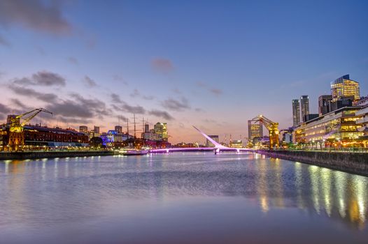 Puerto Madero and the Puente de la mujer in Buenos Aires, Argentina, at sunset