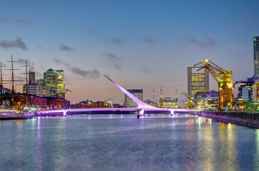 Puerto Madero and the Puente de la mujer in Buenos Aires, Argentina, at sunset