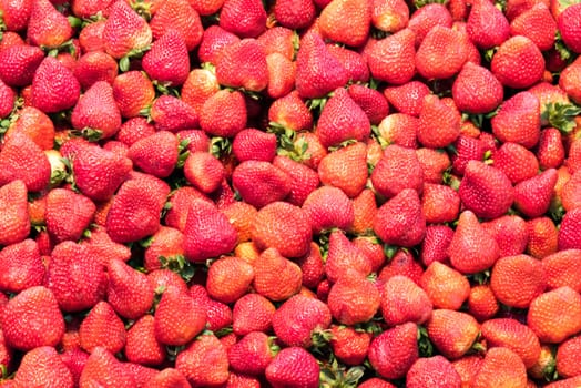 Background from fresh strawberries seen at a market