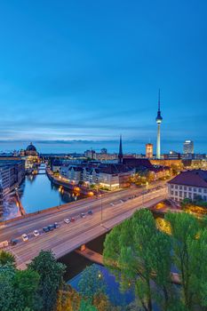 The historic center of Berlin with the famous Television Tower after sunset