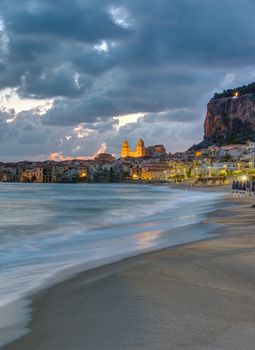 The beach of Cefalu in Sicily before sunrise