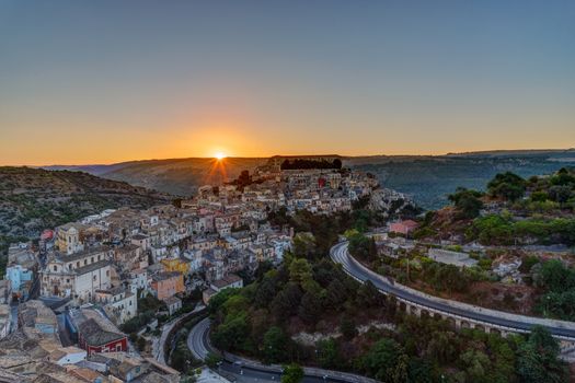 The sun rises over Ragusa Ibla in Sicily, Italy