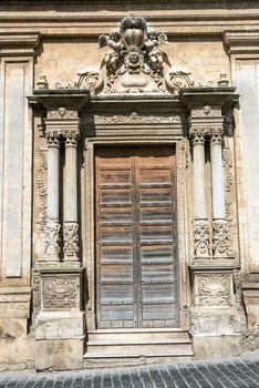 An ornated old door seen on Caltagirone, Sicily