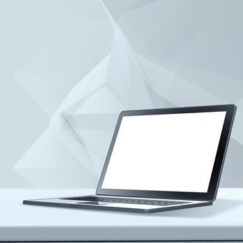 Laptop with blank screen on laminate table and low poly geometric  background