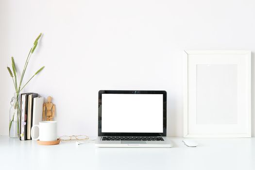 Workspace desk and laptop. copy space and blank screen. Business image, Blank screen laptop and supplies. 