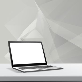 Laptop with blank screen on laminate table and low poly geometric  background