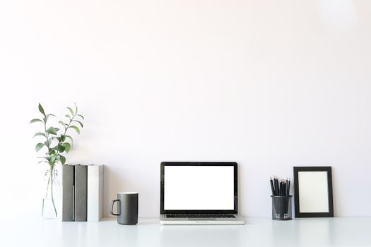 Workspace desk and laptop. copy space and blank screen. Business image, Blank screen laptop and supplies.