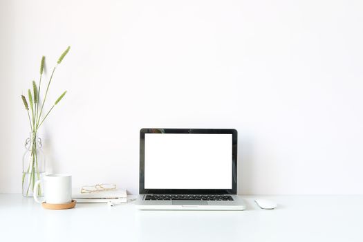 Workspace desk and laptop. copy space and blank screen. Business image, Blank screen laptop and supplies.